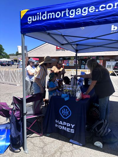 Happy Homes and Guild Mortgage vendor booth at Coal Mine Spring Festival